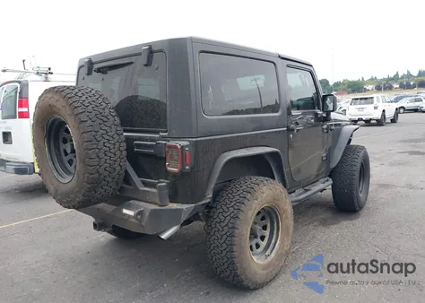 2012 Jeep Wrangler Sport z USA, uszkodzony, nr VIN 1C4GJWAG4CL214339